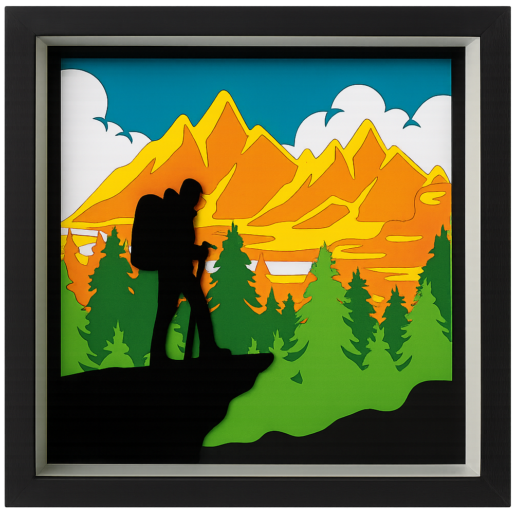 Hiker silhouetted against mountain backdrop